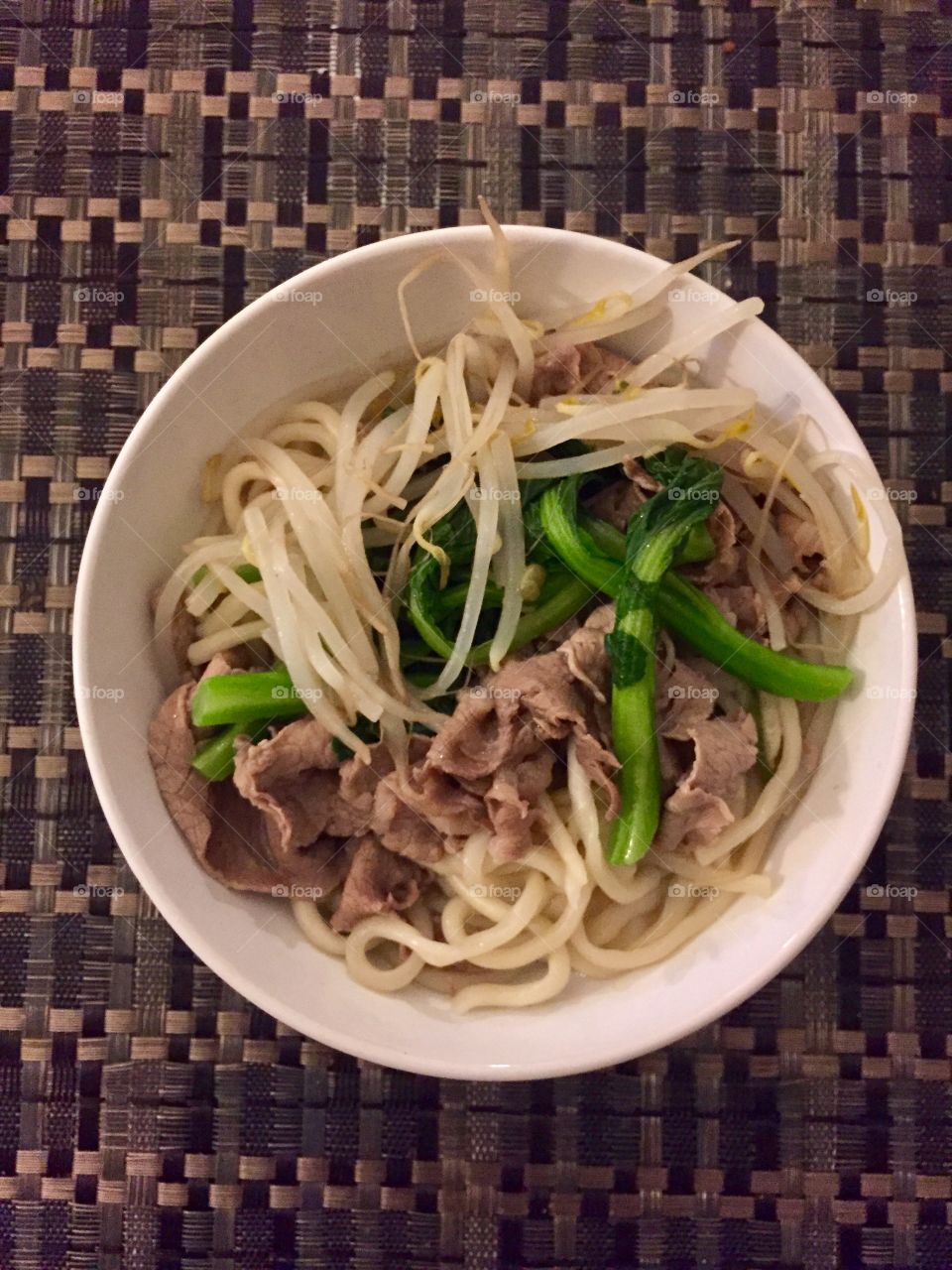Flat noodles with sliced ribeye steak, bean sprouts and Shanghai bokchoy 