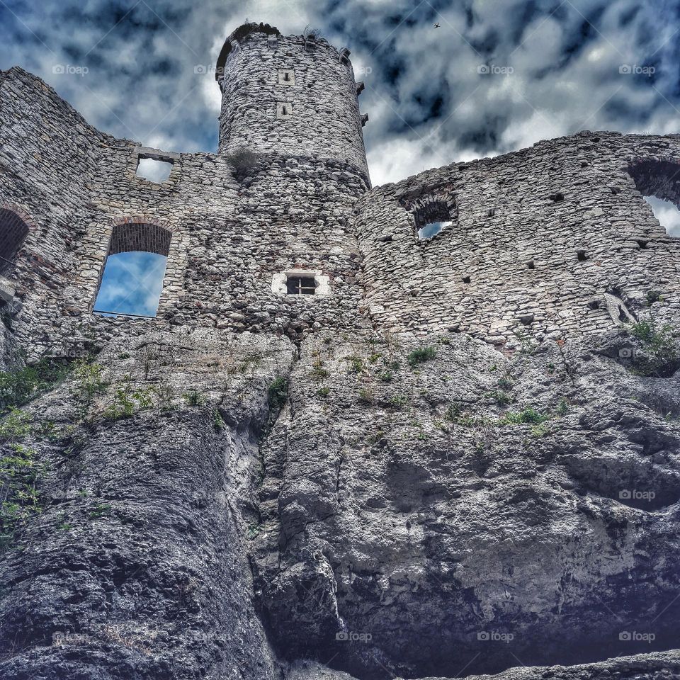 Medieval Castle Ruins Under Dramatic Sky