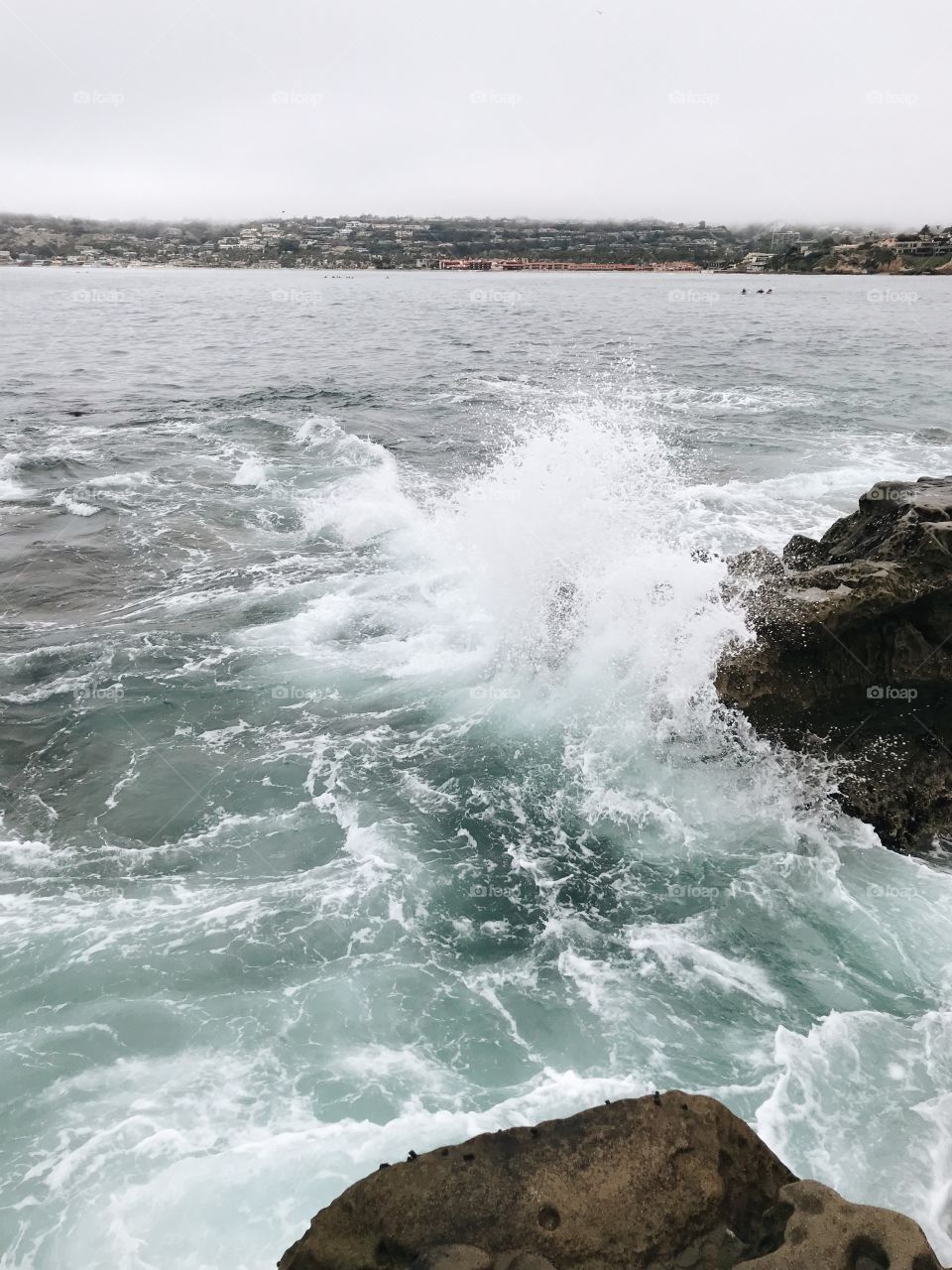 Waves crashing on rock 