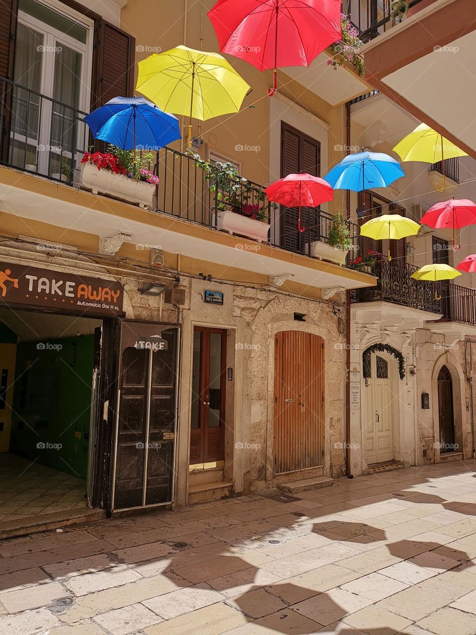 Summer in the city. Colourful umbrellas.