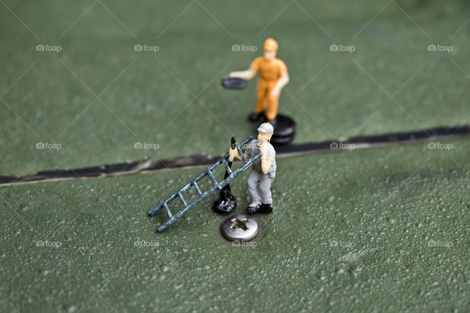 The workers are working construction. 