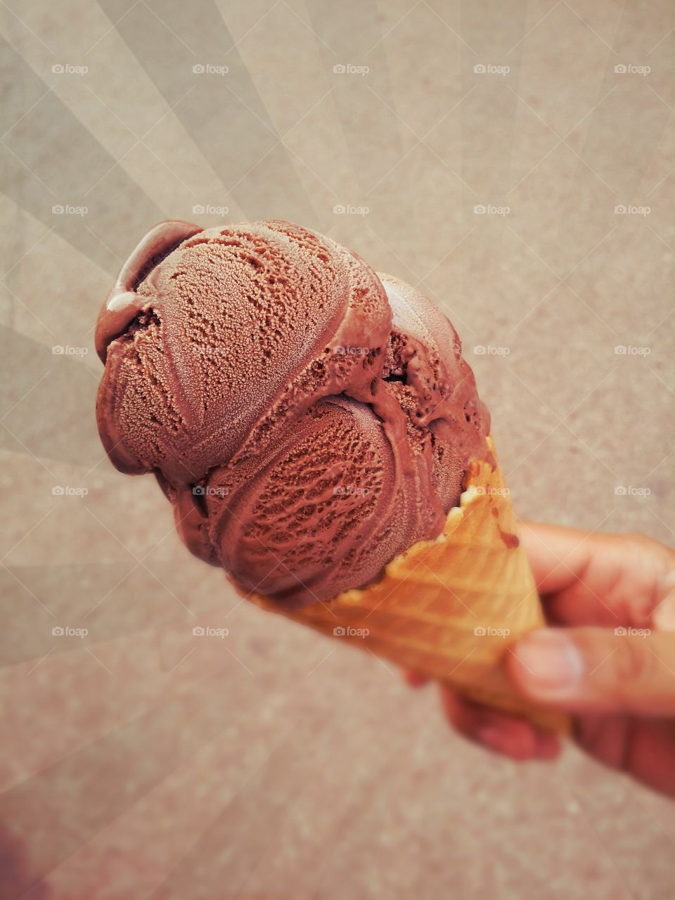 Chocolate Cone.. Chocolate ice cream cone in hand at Pai walking street Thailand.