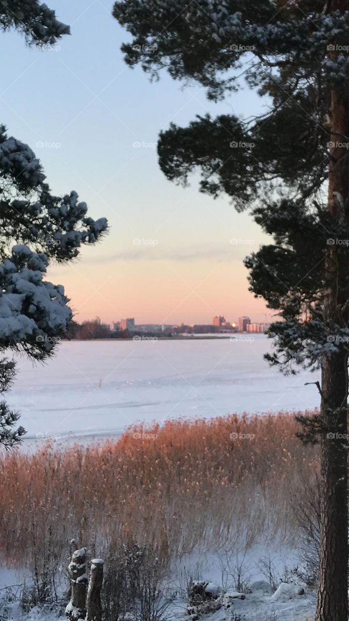 Västerås city in the distance during sunset a winter afternoon