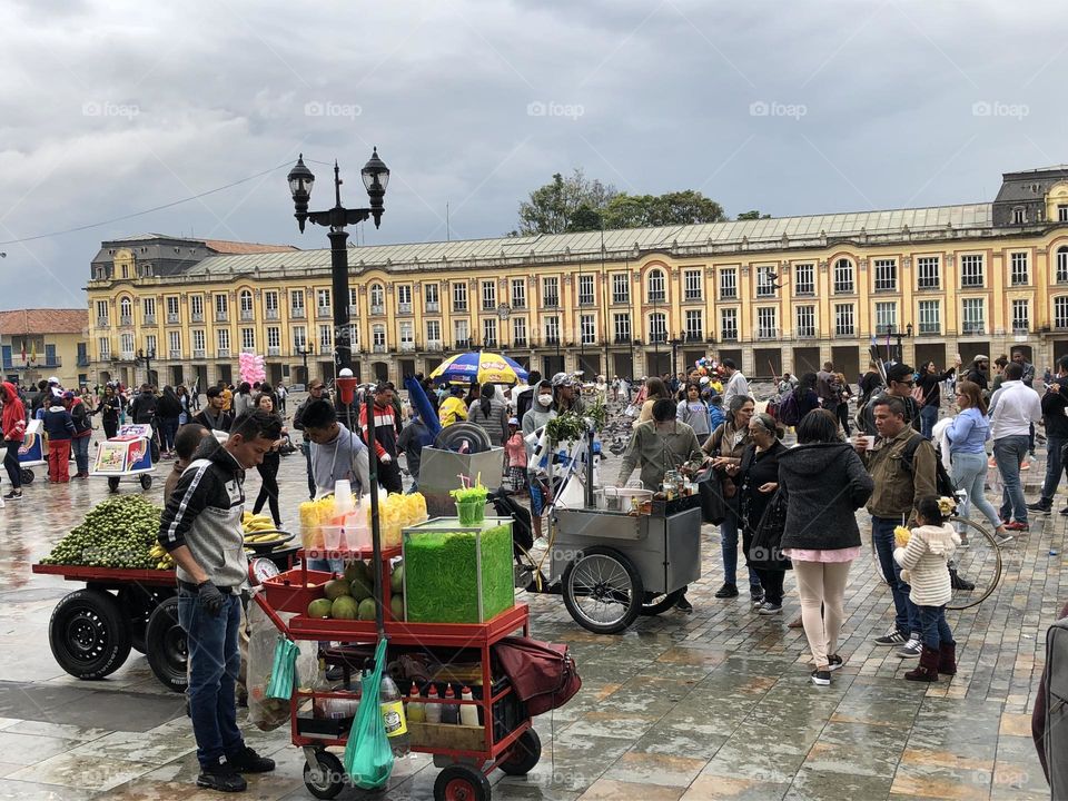 Selling wares in a public square, Bogota, Colombia 