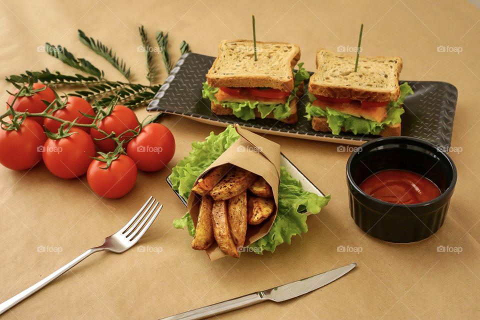 fried homemade potato and sandwiches with tomato ketchup