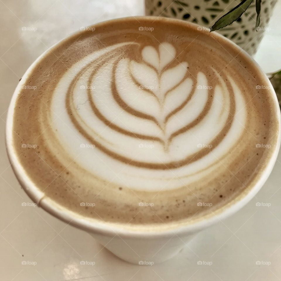 Latte art on white table