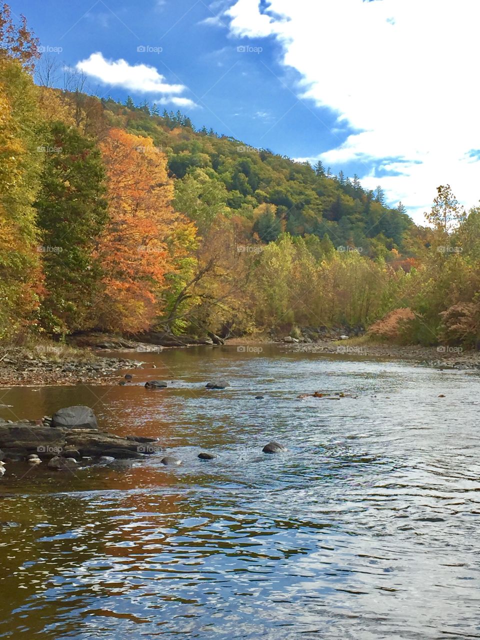 Vermont river in fall. 