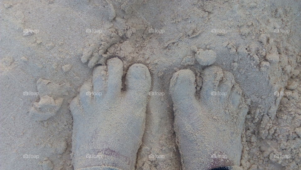 Feet in the sand