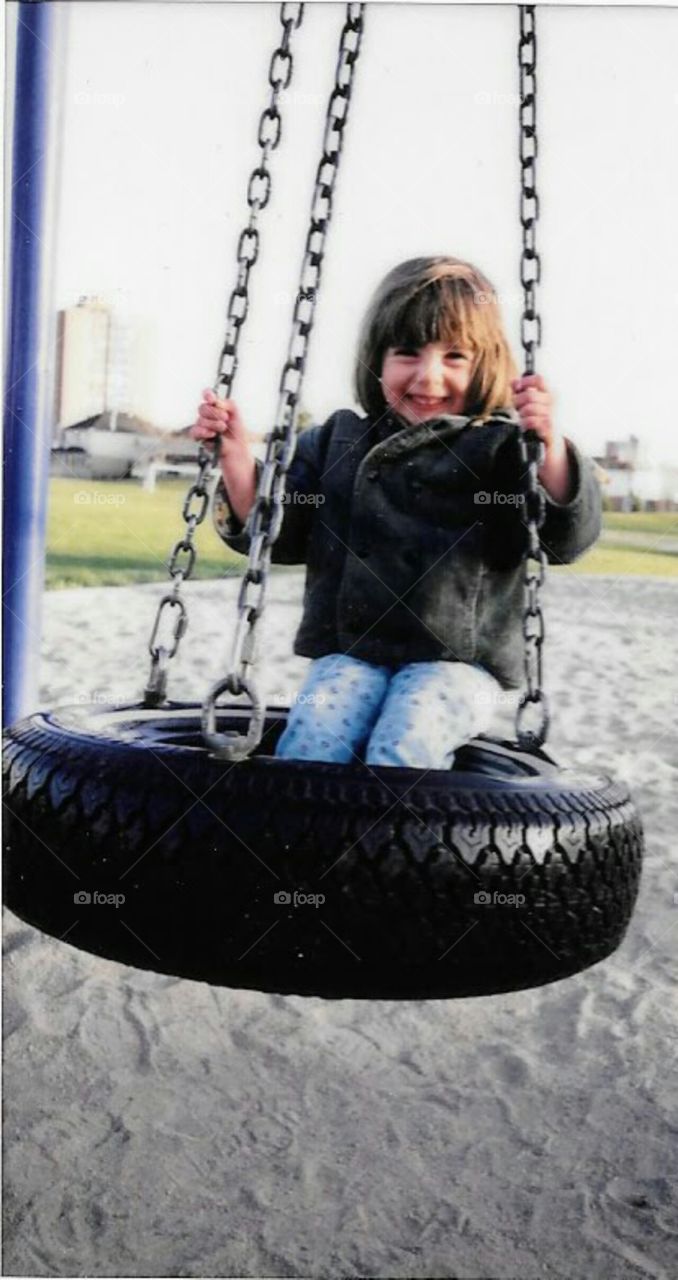 Happiness is a tire swing.