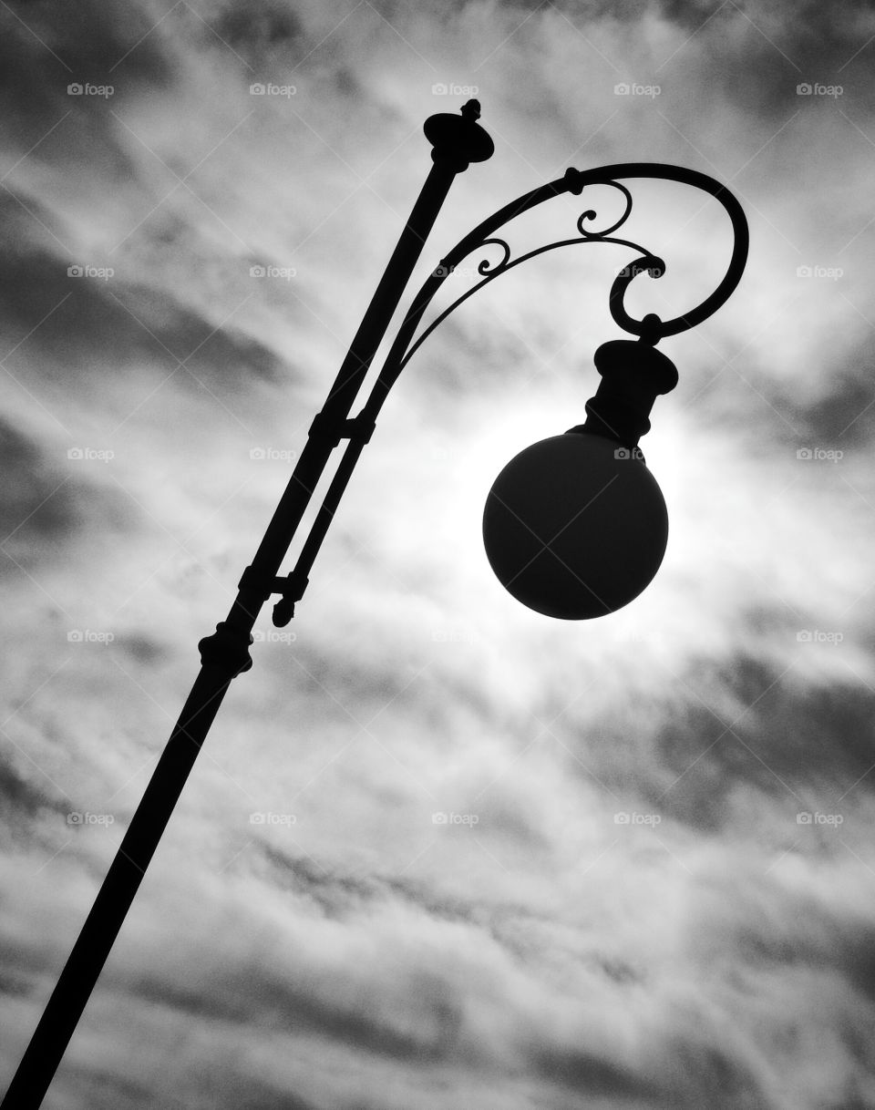 Hanging lamp post. Streetlight silhouette