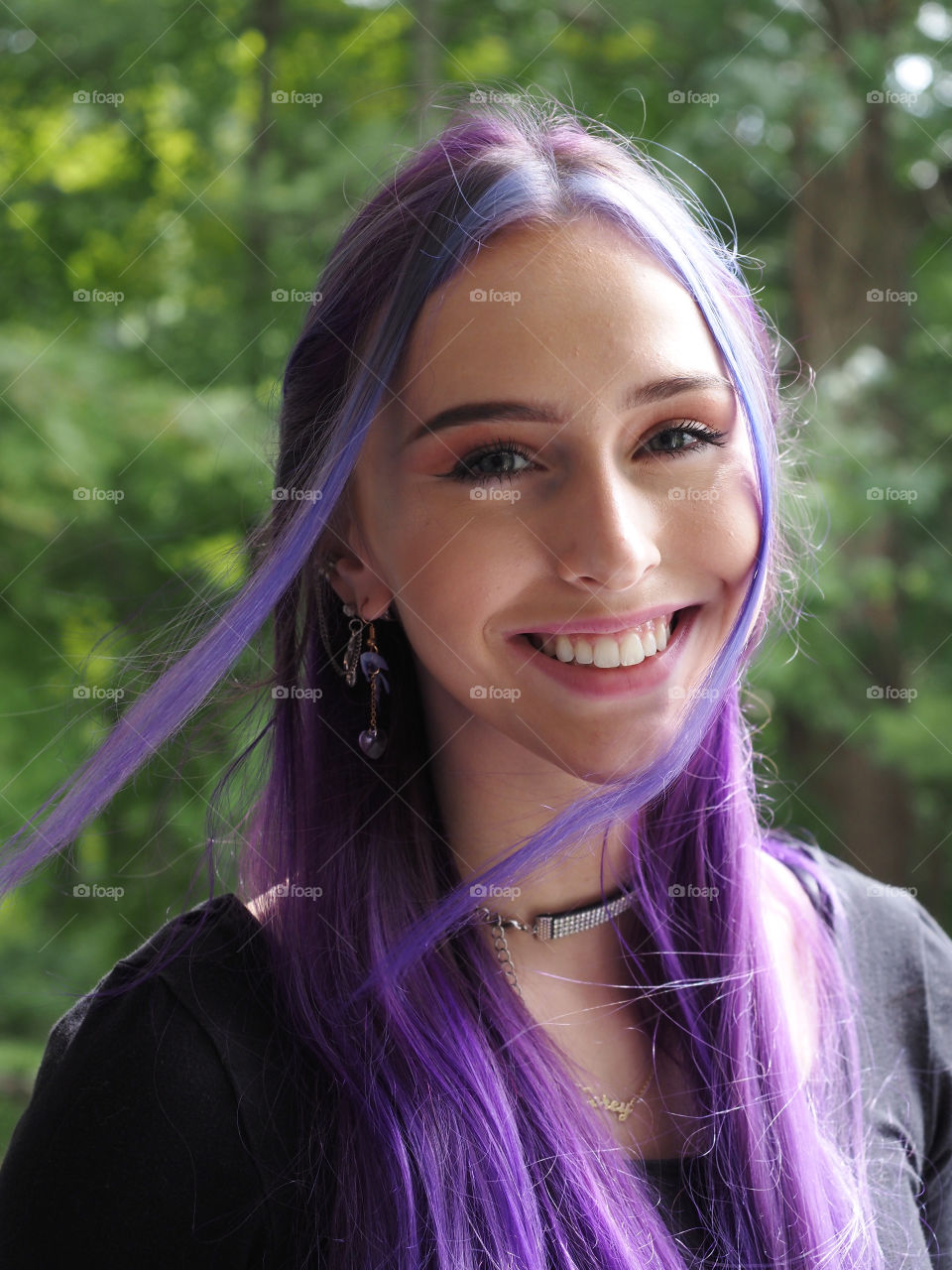My daughter, beautiful smile, pretty young woman outdoors purple hair