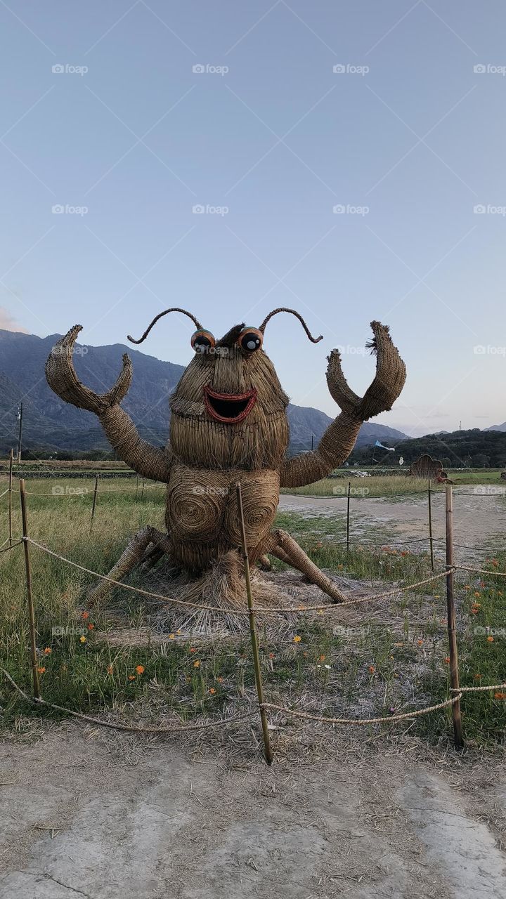 Hermit crab made of straw in the park