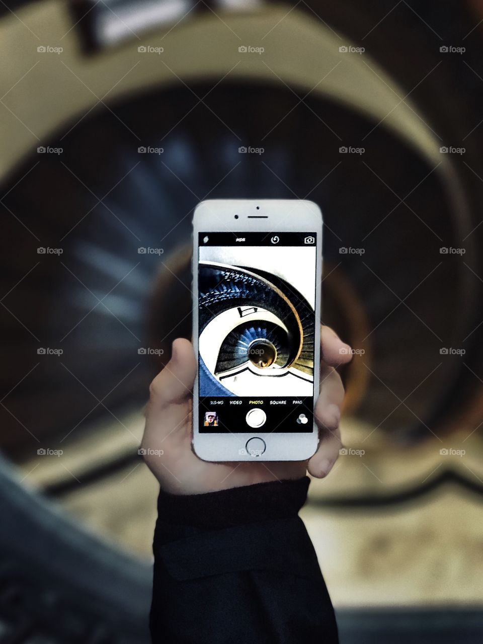 A photo within a photo of one of the many beautiful spiral staircase visual art spots in San Francisco. Capture the Moment. Explore Your City More