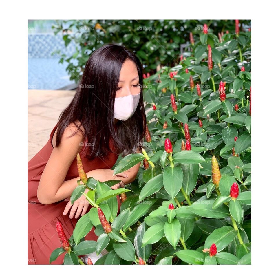 Asian woman in silver grey ash hair colour outdoor 