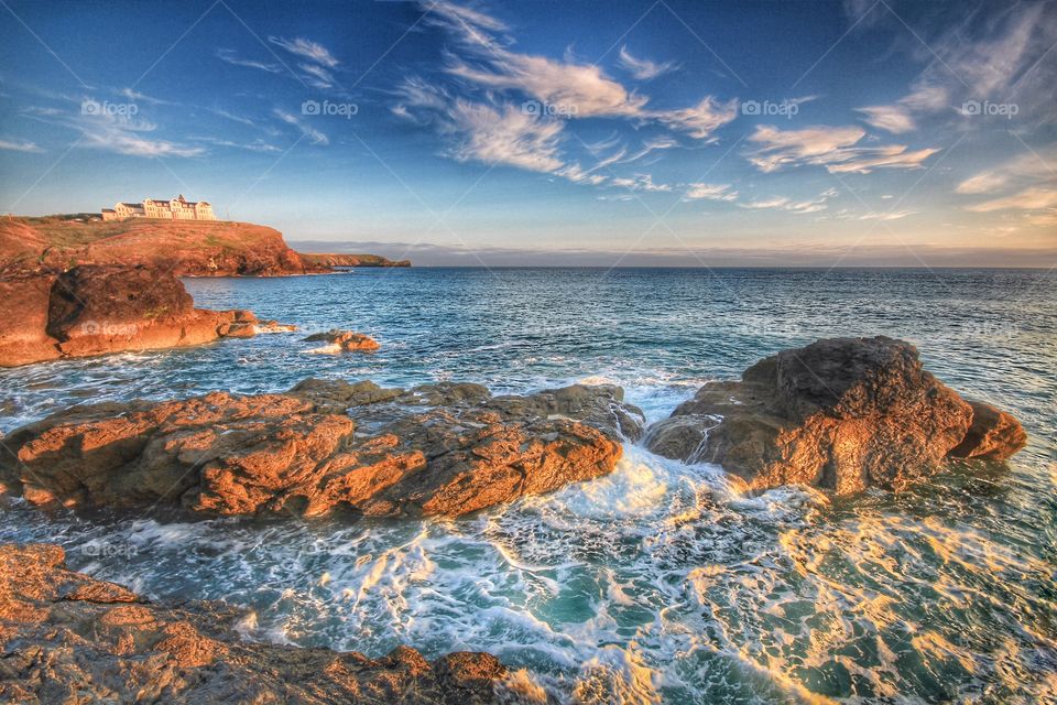 Clifftop Hotel. A cliff top hotel overlooks a dramatic Ocean sunset on a warm summers evening.