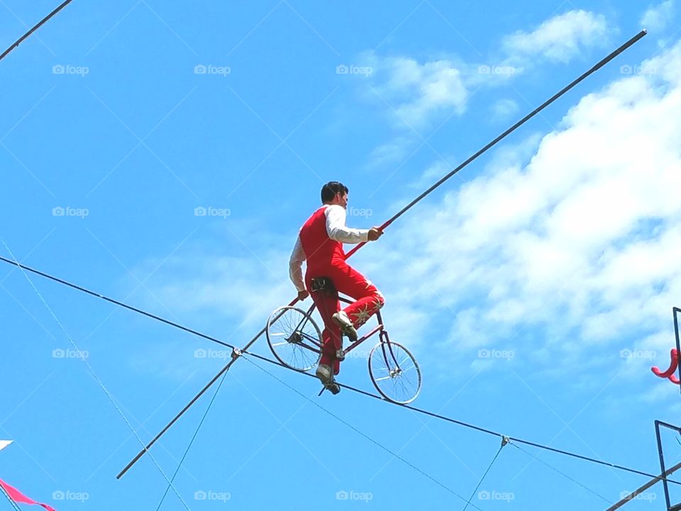 High wire cyclist