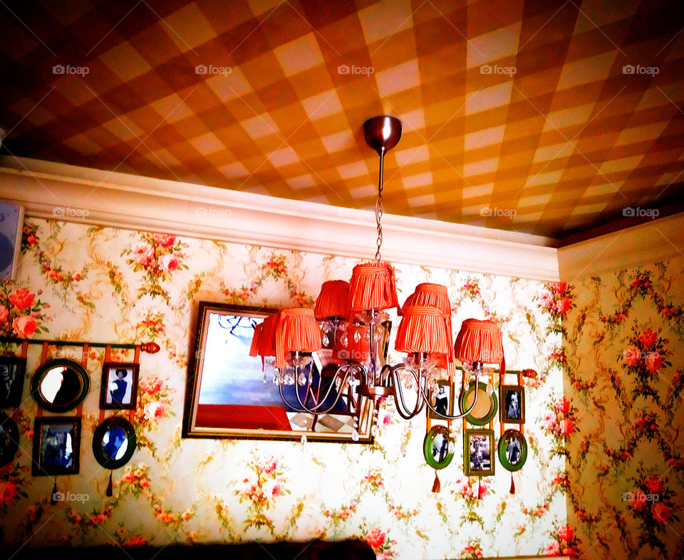 60s decor. Lamp with lampshades, old photographs