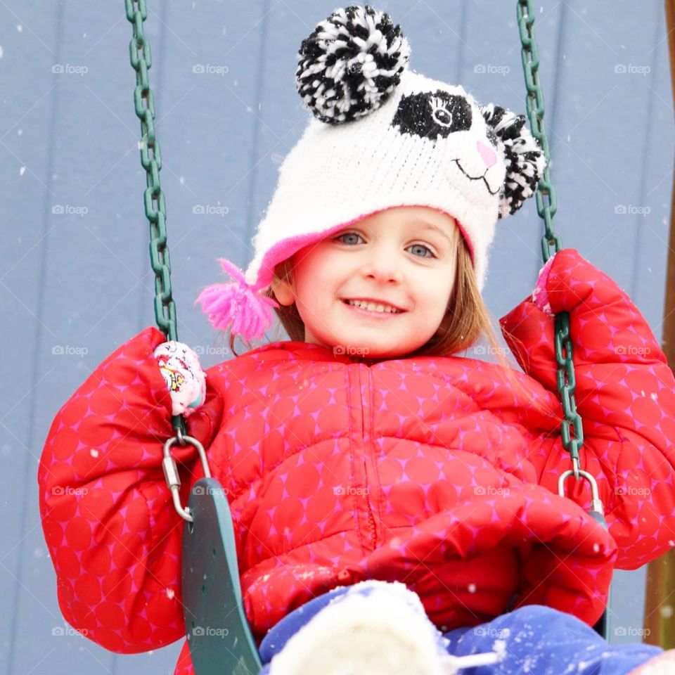 swinging in the snow