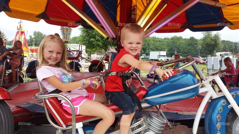 Kiddie Day at Fair. Carnival rides