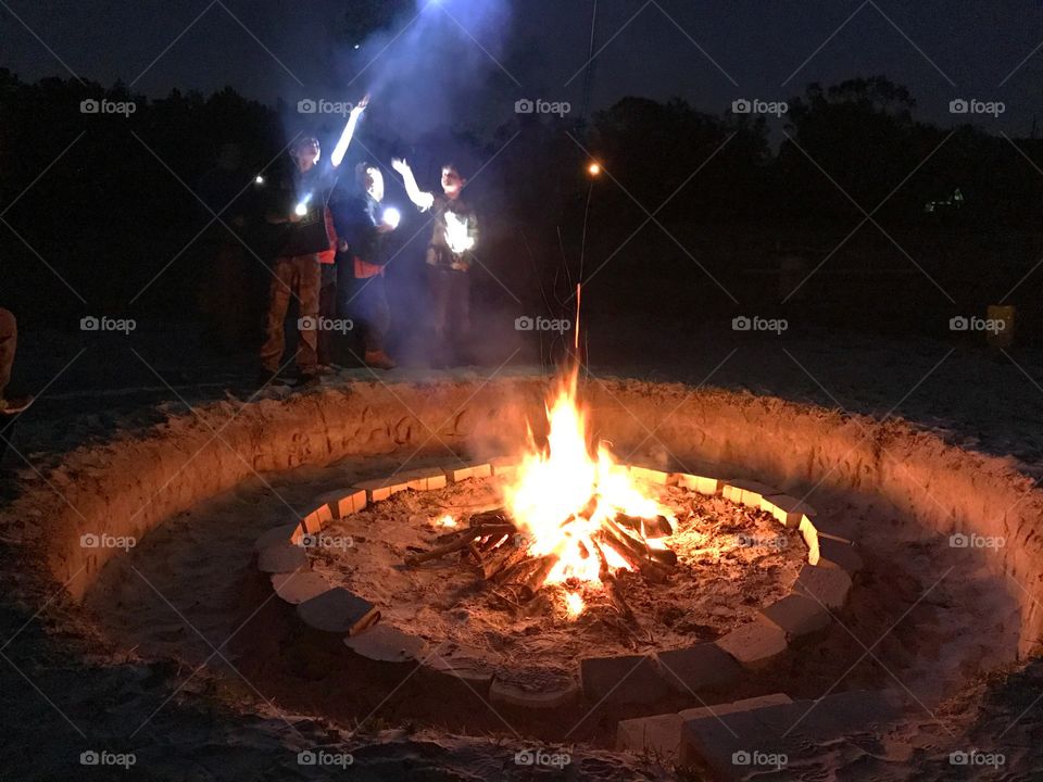 Campfire and flashlights