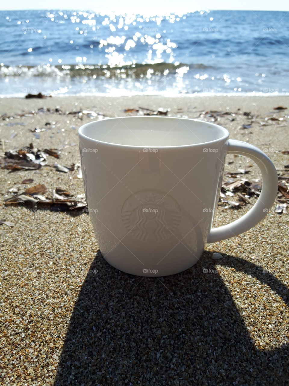 cup of coffe in the sea