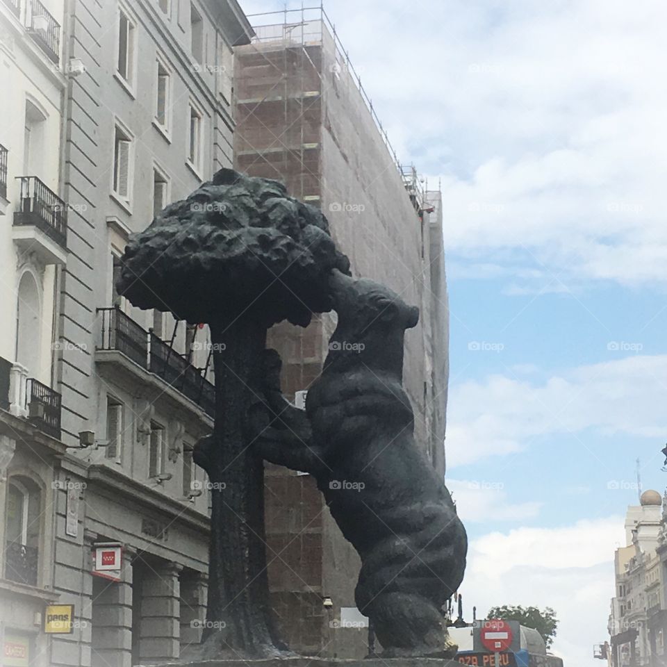 Bear and the Strawberry Tree Statue in Madrid on a spring day 