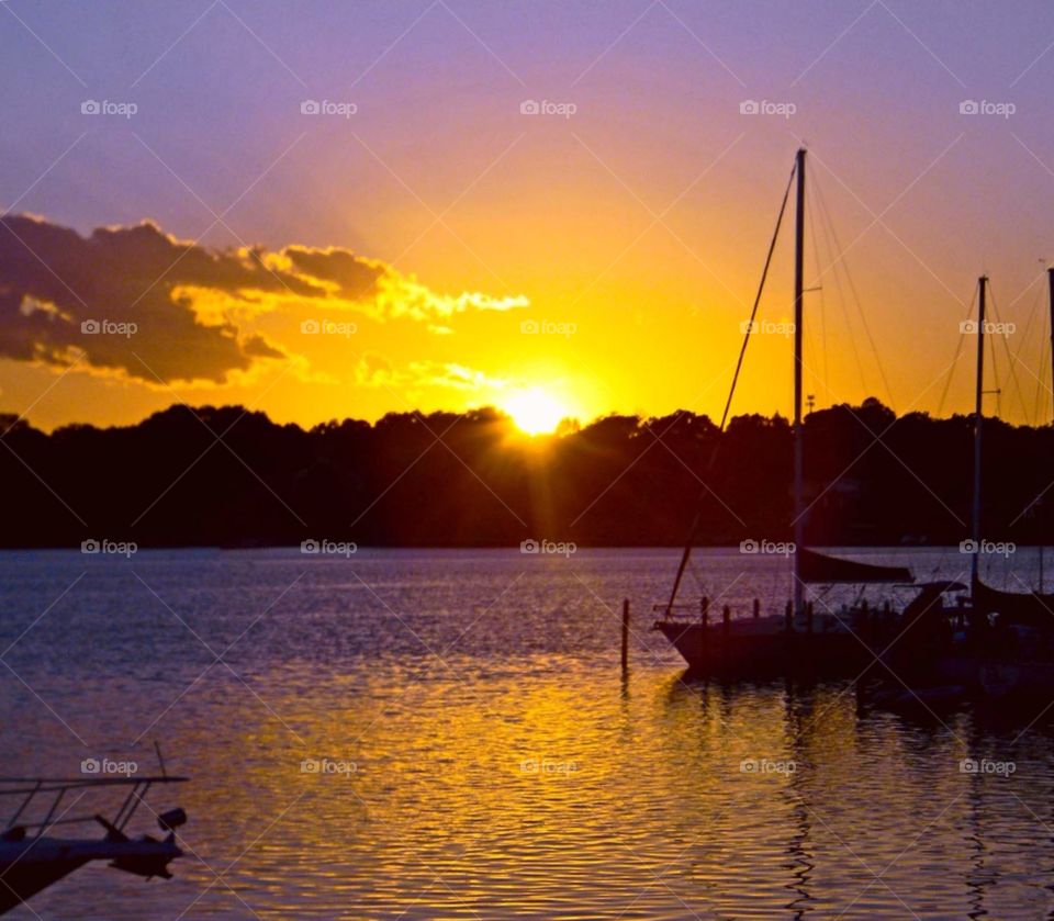 Sunset and sail boat