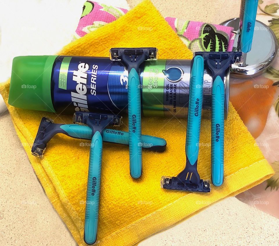 Shaving cream and razors for grooming.