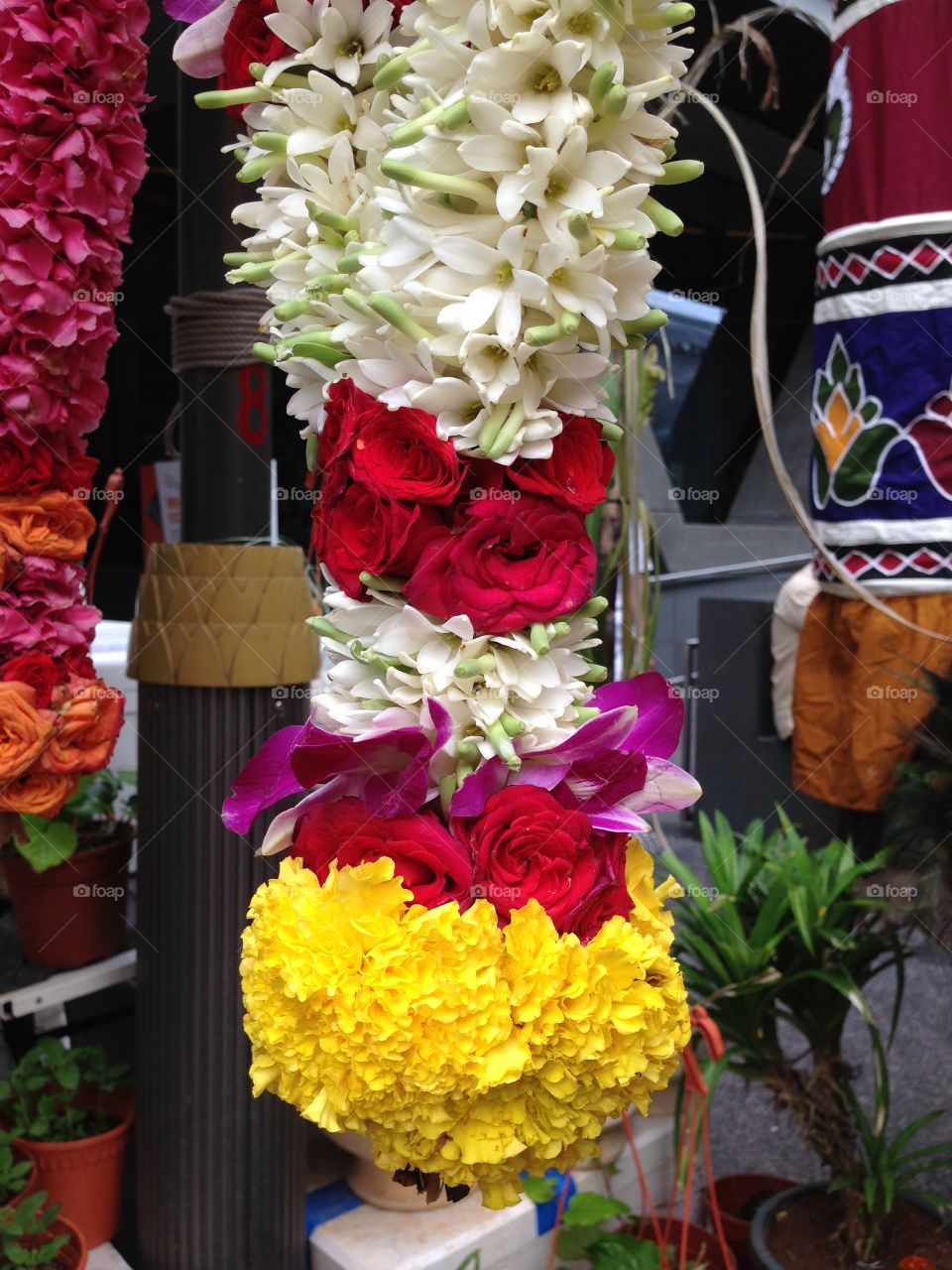 Close-up of a beautiful, bright and colorful garland for sale in little India, Singapore.