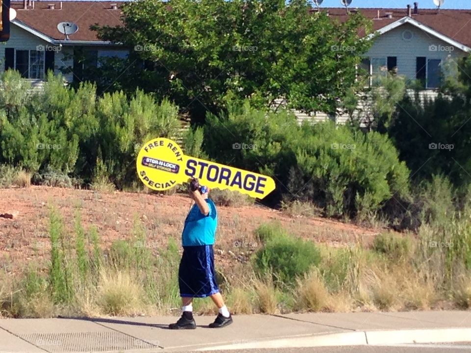 man who makes the human advertising sign