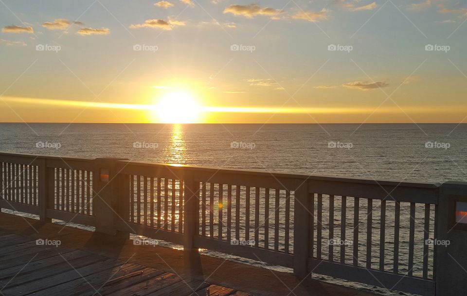 Beautiful sunset over the Gulf of Mexico from the Panama City Beach pier.