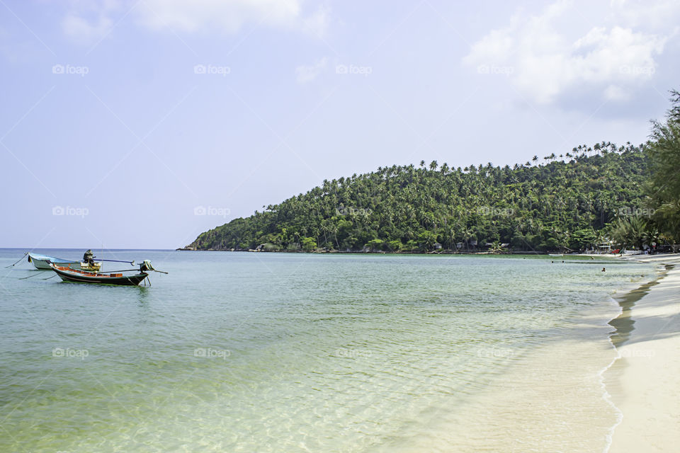 Fishing boats parked on the Beach at Haad salad , koh Phangan, Surat Thani in Thailand.