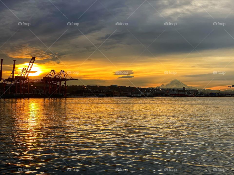Seattle Harbor sunrise with Mt Rainier in the distant background