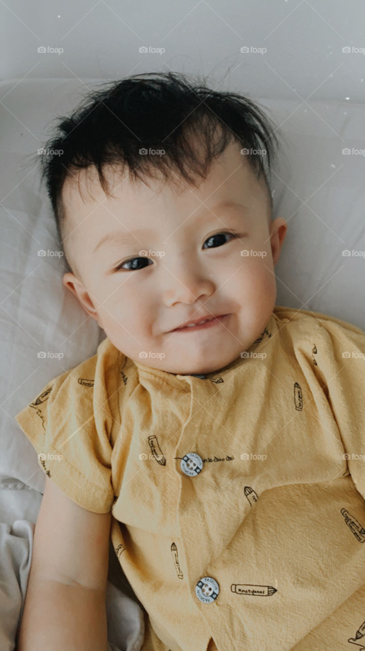 The real side of motherhood is seeing happy smiley kid 