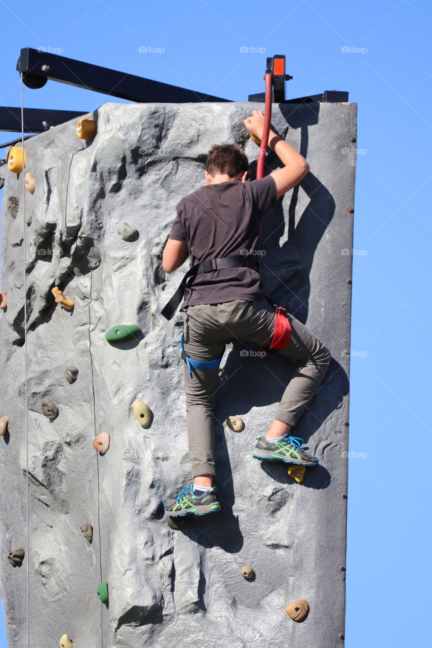 Reaching for the top! Youth rock climbing 