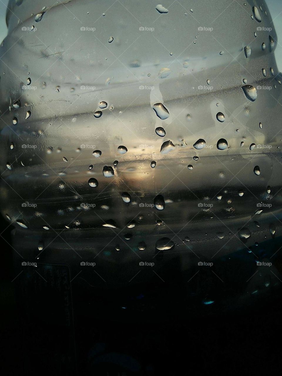 Droplets and view to sunset.