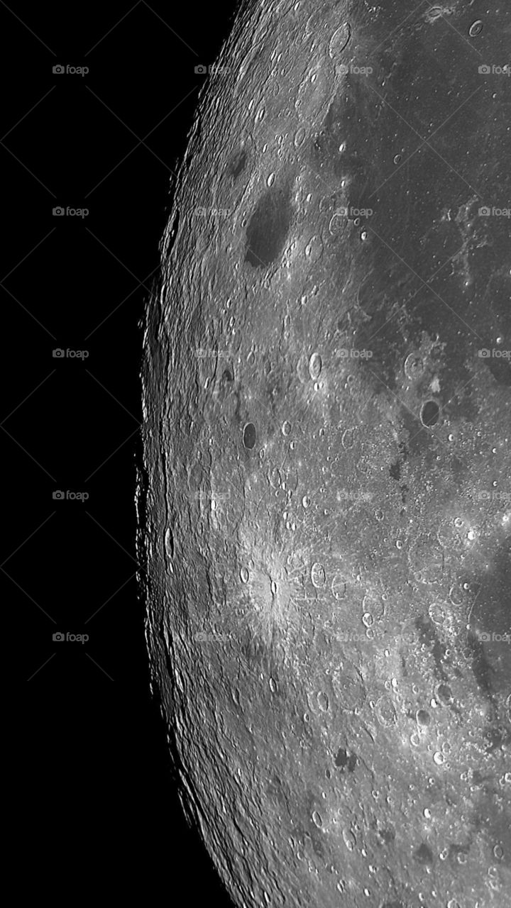 Looking at the moon dark and light side craters