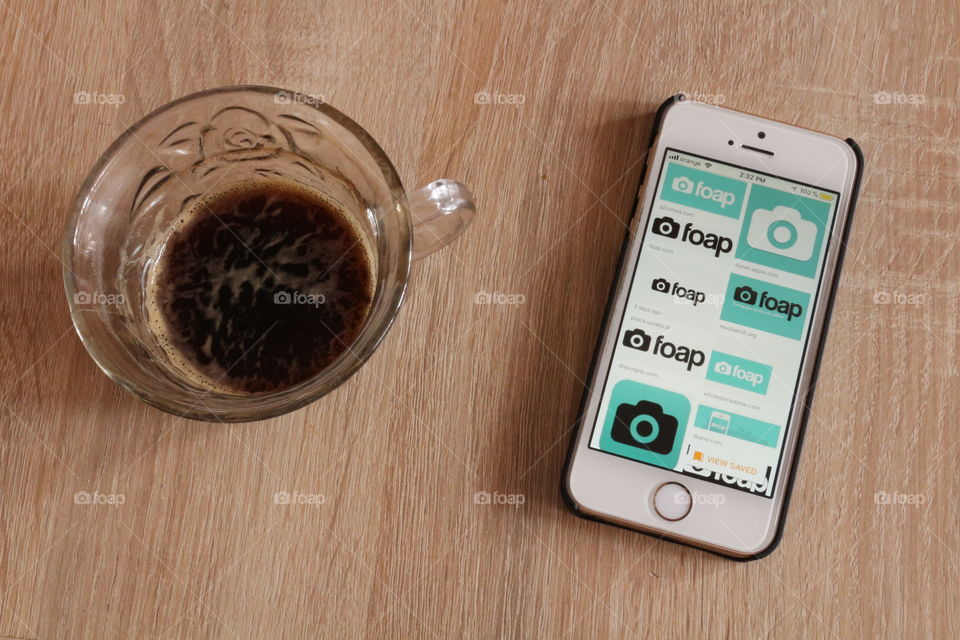 Coffee and phone searching Foap on Google 