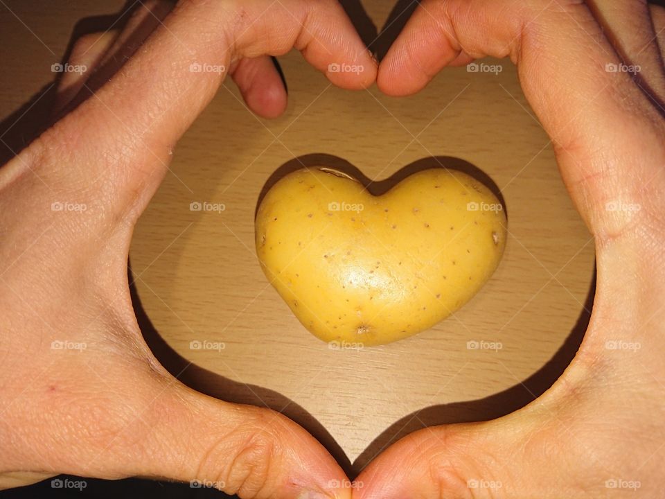 Heart-shaped potato heart gesture