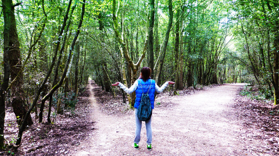 Woman with a doubt,what is the right side in the woods?