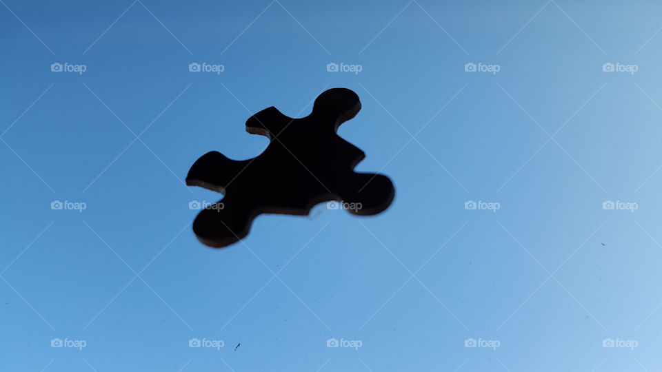 puzzle piece with blue background