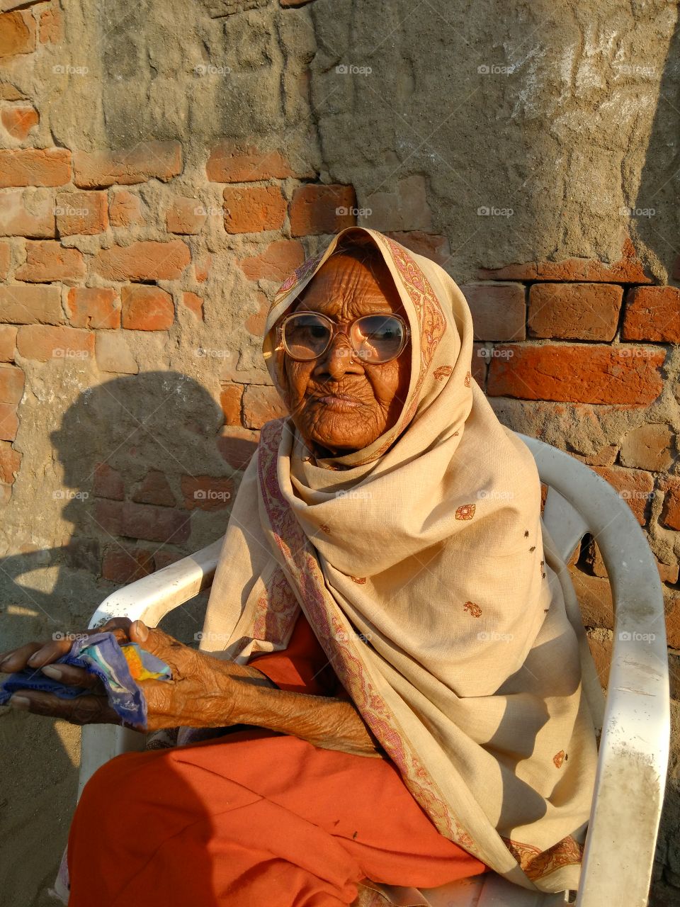 Portrait of a senior woman sitting on chair