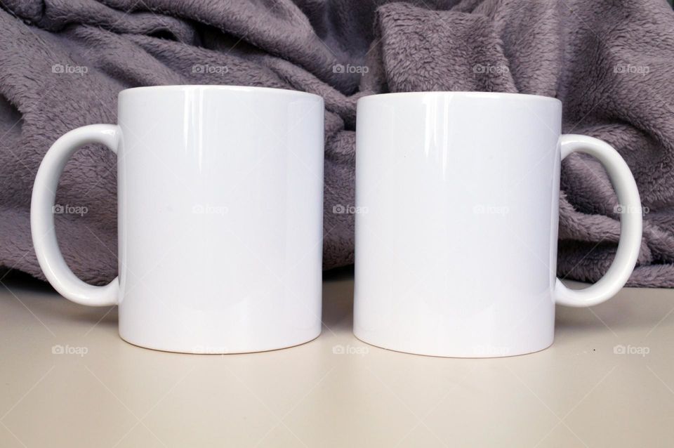 Two white ceramic cups for applying images and photos