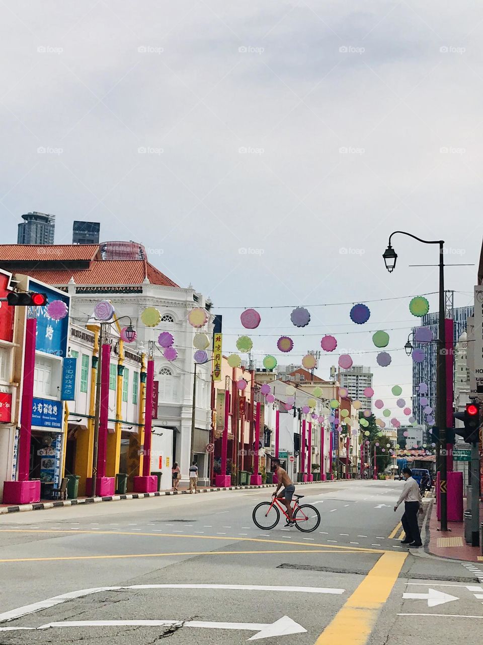 Crossing (A man crossing a colorful street in Singapore)