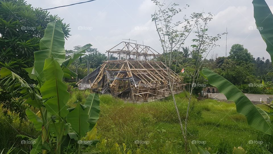bamboo scaffolding used in the construction of a house