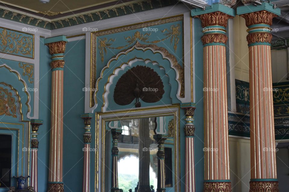 Blend of Persian, Islamic, and Indian styles, highlighted by grand domes, intricate marble inlays,