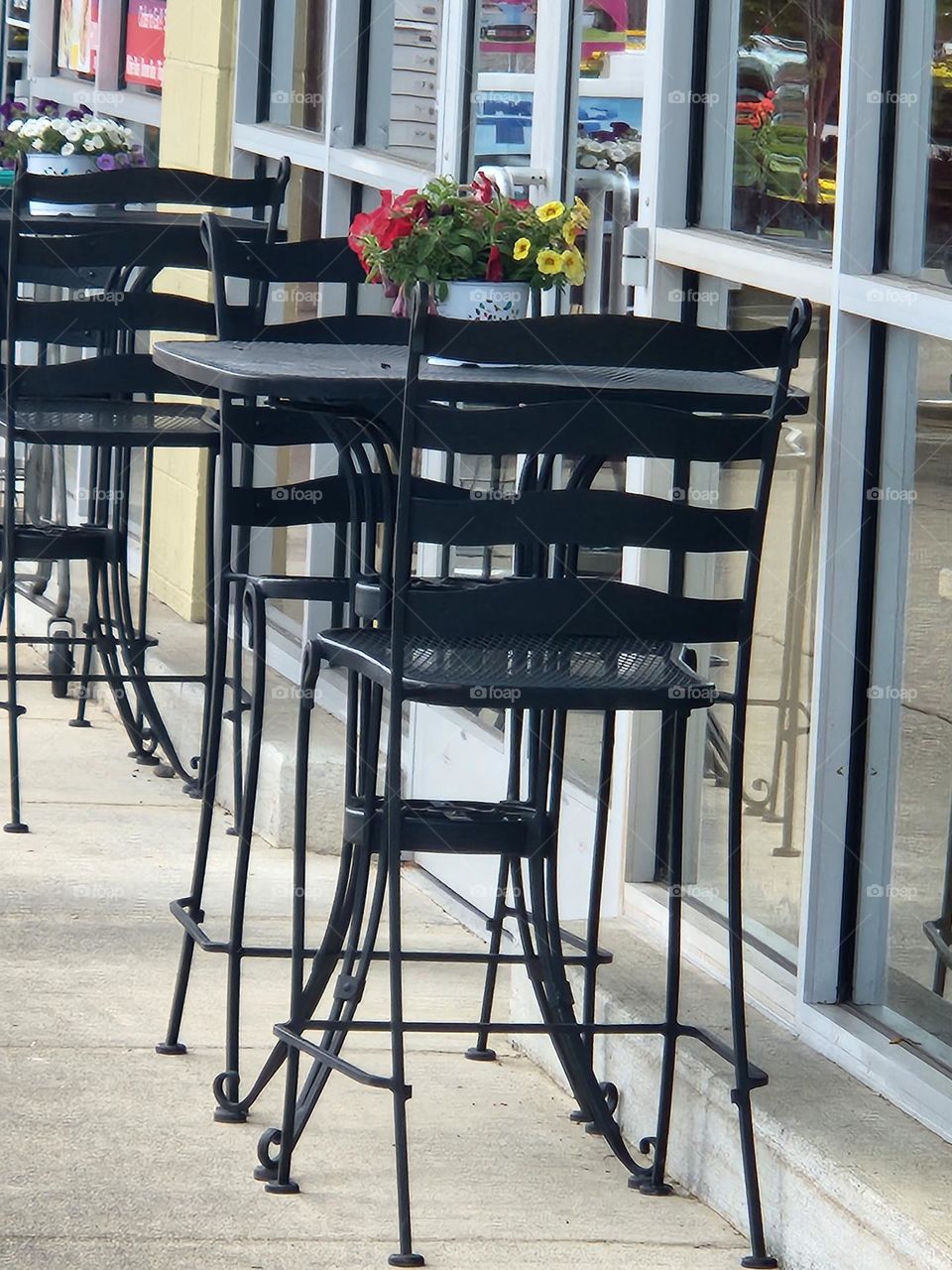 outdoor intimate table seating for two with flower focal