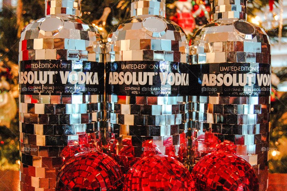 Vodka. Three limited edition absolute vodka bottles with Christmas ornaments.