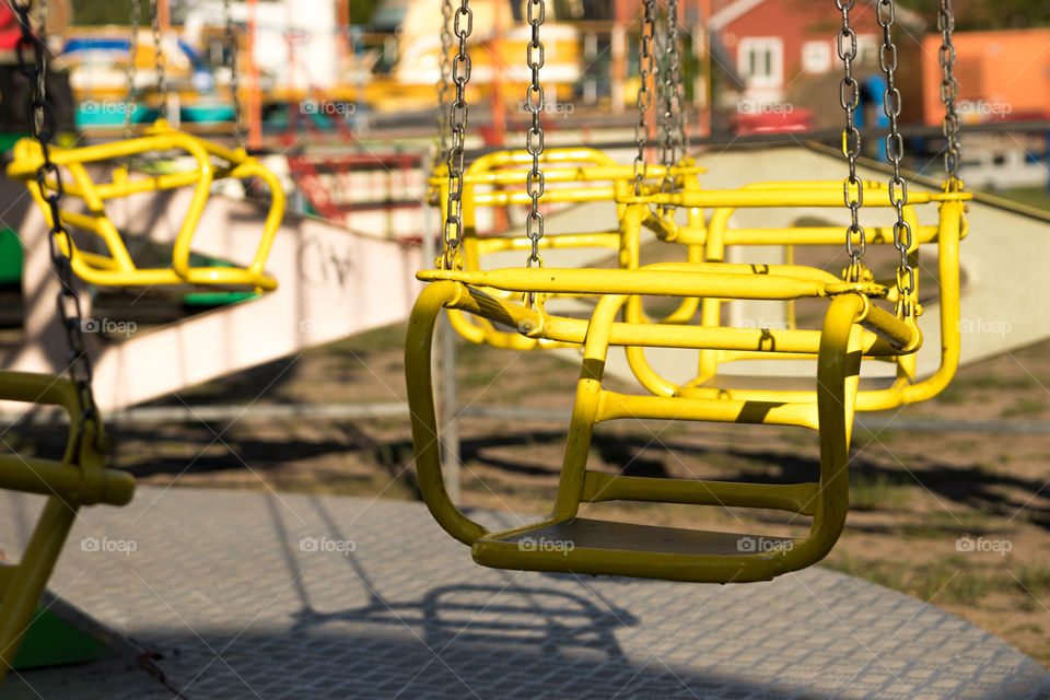 classic old swing ride at a small travelling carnival