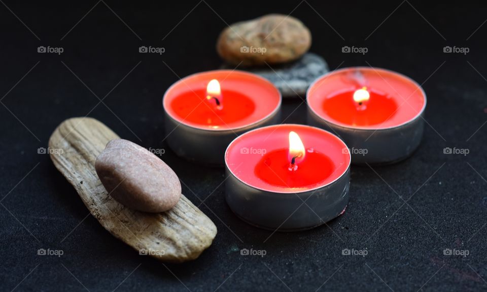 red candles on black background